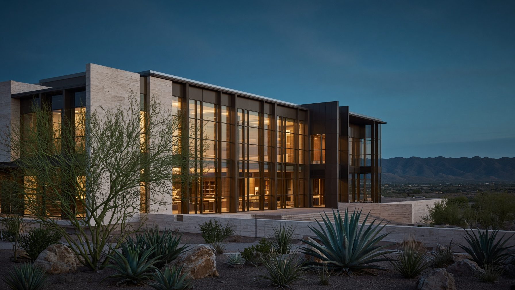 A contemporary commercial building at dusk in the Arizona desert